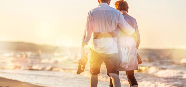 Couple walking on the beach